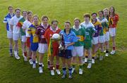 3 February 2005; Inter-county players at the launch of the 2005 Suzuki Ladies National Football League, from left, Emma Donovan, Monaghan, Anne Marie Walsh, Kildare, Mary Hayes, Carlow, Grainne Ni Fhlatharta, Tyrone, Una Downes, Roscommon, Valerie Mulcahy, Galway, Anne Marie O'Shea, Louth, Mary O'Rourke, Dublin, Patrice Dennehy, Kerry, Mairead Kelly, Limerick, Claire Peters, Wexford, Katie Gleeson, Donegal, Lisa Brick, Kilkenny and Juliet Murphy, Cork. This will be the 27th Ladies National Football League and the 3rd year the competition will be sponsored by Suzuki Ireland. Picture credit; Brendan Moran / SPORTSFILE