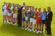3 February 2005; Minister for Sport, Tourism and the Arts, John O'Donoghue, TD, with Niall O'Gorman, General Manager, Suzuki Ireland, Helen O'Rourke, Chief Executive, Ladies Football Association, and inter-county players, from left, Emma Donovan, Monaghan, Anne Marie Walsh, Kildare, Juliet Murphy, Cork, Mary Hayes, Carlow, Grainne Ni Fhlatharta, Tyrone, Lisa Brick, Kilkenny, Katie Gleeson, Donegal, Una Downes, Roscommon, Claire Peters, Wexford, Mairead Kelly, Limerick, Valerie Mulcahy, Galway, Patrice Dennehy, Kerry, Anne Marie O'Shea, Louth and Mary O'Rourke, Dublin, at the launch of the 2005 Suzuki Ladies National Football League. This will be the 27th Ladies National Football League and the 3rd year the competition will be sponsored by Suzuki Ireland. Picture credit; Brendan Moran / SPORTSFILE
