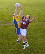 3 February 2005; Una Downes, left, Roscommon, and Valerie Mulcahy, Galway, jump for possession at the launch of the 2005 Suzuki Ladies National Football League in Cork Institute of Technology. This will be the 27th Ladies National Football League and the 3rd year the competition will be sponsored by Suzuki Ireland. Picture credit; Brendan Moran / SPORTSFILE