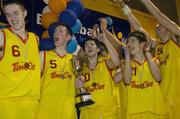 3 February 2005; St. Fintan's players, from left, Darren O'Moore, Jody O'Neill, Erin Grace, Nicholas Pavlin and Conor Baron, celebrate with the cup after victory in the final. All-Ireland Schools Cup, U19 A Boys Final, St. Fintan's, Sutton, Dublin v Calasanctius, Oranmore, Galway, National Basketball Arena, Tallaght, Dublin. Picture credit; Brian Lawless / SPORTSFILE