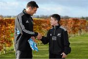 20 November 2013; George Morgan, from Perrystown, Co. Dublin, meets All Black out-half Dan Carter during a meet and greet, hosted by AIG, ahead of an AIG Kicking Clinic. Castleknock Hotel & Golf Club, Castleknock, Co. Dublin. Picture credit: Brendan Moran / SPORTSFILE