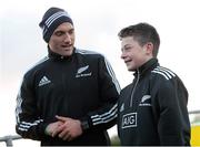 20 November 2013; George Morgan, from Perrystown, Co. Dublin, with New Zealand's Aaron Crudden during an AIG Kicking Clinic. Westmanstown Sports Centre, Clonsilla, Co. Dublin. Picture credit: Brendan Moran / SPORTSFILE
