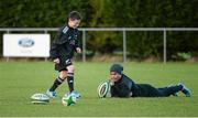 20 November 2013; George Morgan, from Perrystown, Co. Dublin, with New Zealand's Aaron Smith during an AIG Kicking Clinic. Westmanstown Sports Centre, Clonsilla, Co. Dublin. Picture credit: Brendan Moran / SPORTSFILE