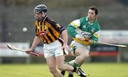 6 February 2005; Derek Lyng, Kilkenny, in action against Michael Cordial, Offaly. Walsh Cup, Semi-Final, Offaly v Kilkenny, St. Brendan's Park, Birr, Co. Offaly. Picture credit; Damien Eagers / SPORTSFILE