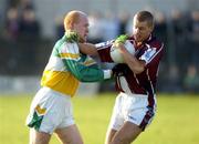 6 February 2005; Denis Glennon, Westmeath, in action against Conor Evans, Offaly. Allianz National Football League, Division 1A, Offaly v Westmeath, O'Connor Park, Tullamore, Co. Offaly. Picture credit; Damien Eagers / SPORTSFILE