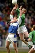 6 February 2005; John Quane, Limerick, in action against Noel Garvan, Laois. Allianz National Football League, Division 1B, Laois v Limerick, O'Moore Park, Portlaoise, Co. Laois. Picture credit; Matt Browne / SPORTSFILE