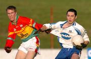 6 February 2005; Stephen Gollogly, Monaghan, in action against Paul Cashin, Carlow. Allianz National Football League, Division 2A, Monaghan v Carlow, O'Neill Park, Clontibrit, Co. Monaghan. Picture credit; Pat Murphy / SPORTSFILE