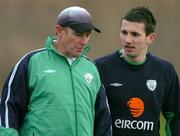 6 February 2005; Liam Miller, right, Republic of Ireland, with manager Brian Kerr during squad training. Malahide FC, Malahide, Co. Dublin. Picture credit; David Maher / SPORTSFILE