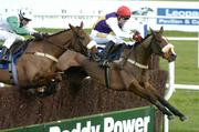 6 February 2005; Carrigeen Victor, with Robert Power up, jump the last ahead of Well Presented, Timmy Murphy, on their way to winning the Dr. P.J. Moriarty Novice Steeplechase. Leopardstown Racecourse, Dublin. Picture credit; Ray McManus / SPORTSFILE