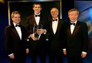 6 February 2005; Kevin Kilbane, is presented with the Senior International Player of the year award by, from left; Philip Nolan, eircom Chief Executive, David Blood, Assistant President of the FAI and Minister for Family and Social Affairs Seamus Brennan T.D., at the 2004 FAI / eircom International Soccer Awards. Citywest Hotel, Dublin. Picture credit; David Maher / SPORTSFILE