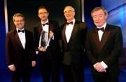 6 February 2005; Martin O'Neill, Glasgow Celtic Manager, is presented with the International Personality of the year award by, from left; Philip Nolan, eircom Chief Executive, David Blood, Assistant President of the FAI and Minister for Family and Social Affairs Seamus Brennan T.D., at the 2004 FAI / eircom International Soccer Awards. Citywest Hotel, Dublin. Picture credit; David Maher / SPORTSFILE