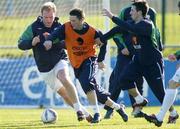 7 February 2005; Robbie Keane, Republic of Ireland, in action against his team-mates Gary Doherty, left and Liam Miller, right, during squad training. Malahide FC, Malahide, Co. Dublin. Picture credit; David Maher / SPORTSFILE