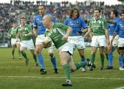 6 February 2005; Ireland's Peter Stringer crosses the line on his way to scoring his sides 2nd try against Italy. RBS Six Nations Championship 2005, Italy v Ireland, Stadio Flamino, Rome, Italy. Picture credit; Brendan Moran / SPORTSFILE
