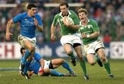6 February 2005; Geordan Murphy, Ireland, supported by team-mate Brian O'Driscoll, in action against Andrea Masi and Gonzalo Canale, Italy. RBS Six Nations Championship 2005, Italy v Ireland, Stadio Flamino, Rome, Italy. Picture credit; Brendan Moran / SPORTSFILE