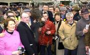 6 February 2005; Rule Supreme winning connections including owner Tom Fallon, second from left, after victory in the Hennessy Cognac Gold Cup. Leopardstown Racecourse, Dublin. Picture credit; Ray McManus / SPORTSFILE