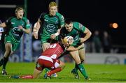 23 November 2013; Jake Heenan, Connacht, is tackled by Aled Thomas, Scarlets. Celtic League 2013/14, Round 8, Connacht v Scarlets, The Sportsground, Galway. Picture credit: Diarmuid Greene / SPORTSFILE
