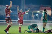 23 November 2013; Scarlets' Shaun Hopkins, centre, and Jake Ball, left, celebrate at the final whistle after victory over Connacht. Celtic League 2013/14, Round 8, Connacht v Scarlets, The Sportsground, Galway. Picture credit: Diarmuid Greene / SPORTSFILE