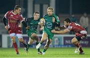 23 November 2013; Fionn Carr, Connacht, supported by team-mate Eoin Griffin, is tackled by Gareth Maule, left, and Gareth Owen, Scarlets. Celtic League 2013/14, Round 8, Connacht v Scarlets, The Sportsground, Galway. Picture credit: Diarmuid Greene / SPORTSFILE