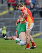 24 November 2013; Alan Feeney, Castlebar Mitchels, pulls the jersey of Frankie Dolan, St Brigid's. AIB Connacht Senior Club Football Championship Final, St Brigid's, Roscommon, v Castlebar Mitchels, Mayo. Dr. Hyde Park, Roscommon. Picture credit: David Maher / SPORTSFILE