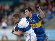 24 November 2013; Kevin Bonnie, St Vincent's, is tackled by David Larkin, Summerhill. AIB Leinster Senior Club Football Championship Semi-Final, St Vincent's, Dublin v Summerhill, Meath. Parnell Park, Dublin. Picture credit: Ray McManus / SPORTSFILE