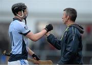 24 November 2013; Na Piarsaigh manager Sean Stack with Kevin Downes after he was substituted late on in the second half. AIB Munster Senior Club Hurling Championship Final, Na Piarsaigh, Limerick v Sixmilebridge, Clare. Cusack Park, Ennis, Co. Clare. Picture credit: Diarmuid Greene / SPORTSFILE