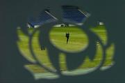 11 February 2005; Through the emblem of the Scottish Rugby Union, Ireland Out-half Ronan O'Gara practices his kicking. Ireland squad kicking practice, Murrayfield, Edinburgh, Scotland. Picture credit; Brendan Moran / SPORTSFILE