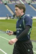 11 February 2005; Out-half Ronan O'Gara has a quick snack during kicking practice. Ireland squad kicking practice, Murrayfield, Edinburgh, Scotland. Picture credit; Brendan Moran / SPORTSFILE