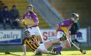 12 February 2005; Darren Stamp, Wexford, in action against Derek Lyng, Kilkenny. Walsh Cup Final, Wexford v Kilkenny, Wexford Park, Co. Wexford. Picture credit; Damien Eagers / SPORTSFILE