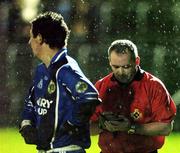12 February 2005; Paul Galvin, Kerry, is booked in the last minute by referee Patrick McGovern. Allianz National Football League, Division 1A, Kerry v Offaly, Austin Stack Park, Tralee, Co. Kerry. Picture credit; Ray McManus / SPORTSFILE