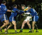 12 February 2005; Niall McNamee, Offaly, is tackled by Tom O'Sullivan, 17, and Marc O Se, Kerry. Allianz National Football League, Division 1A, Kerry v Offaly, Austin Stack Park, Tralee, Co. Kerry. Picture credit; Ray McManus / SPORTSFILE
