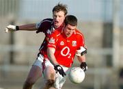 13 February 2005; Noel O'Laoire, Cork, in action against David Kilmartin, Westmeath. Allianz National Football League, Division 1A, Westmeath v Cork, Cusack Park, Mullingar, Co. Westmeath. Picture credit; Pat Murphy / SPORTSFILE