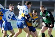 13 February 2005; Shane Daniels, Clare, in action against James Coyle, Monaghan. Allianz National Football League, Division 2A, Clare v Monaghan, Cusack Park, Ennis, Co. Clare. Picture credit; Kieran Clancy / SPORTSFILE
