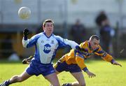13 February 2005; Rory Donnelly, Clare, in action against  James Coyle, Monaghan. Allianz National Football League, Division 2A, Clare v Monaghan, Cusack Park, Ennis, Co. Clare. Picture credit; Kieran Clancy / SPORTSFILE