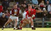 13 February 2005; Martin Cronin, Cork, in action against Alan Mangan and Michael Ennis, left, Westmeath. Allianz National Football League, Division 1A, Westmeath v Cork, Cusack Park, Mullingar, Co. Westmeath. Picture credit; Pat Murphy / SPORTSFILE