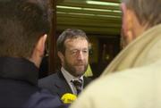 15 February 2005; GAA President Sean Kelly speaks to reporters on his arrival for the launch of the Paidi O Se Football Weekend. The Burlington Hotel, Dublin. Picture credit; Brian Lawless / SPORTSFILE