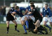 13 February 2005; Robert Gannon, St. Mary's College, Donnybrook, is tackled by Thomas Garvey, left, and Nicholas McCarthy, Cistercian College Roscrea. Leinster Schools Senior Cup Quarter-Final, Cistercian College Roscrea v St. Mary's College, Donnybrook. Donnybrook, Dublin. Picture credit; Brendan Moran / SPORTSFILE