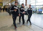 27 November 2013; Clare players Brendan Bugler, left, Tony Kelly, centre, and Colm Galvin at Dublin Airport prior to their departure for Shanghai for the GAA GPA All Star Tour 2013, sponsored by Opel. Dublin Airport, Dublin. Picture credit: Pat Murphy / SPORTSFILE