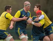 27 November 2013; Munster's Paul O'Connell is tackled by, from left, Billy Holland, Ian Keatley and Gerhard Van Den Heever during squad training ahead of their Celtic League 2013/14, Round 9, game against Newport Gwent Dragons on Friday. Munster Rugby Squad Training, Cork Institute of Technology, Bishopstown, Cork. Picture credit: Matt Browne / SPORTSFILE