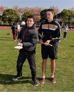 28 November 2013; Clare's Brendan Bugler with Li Cheng Zhi, a student of the Shanghai University, during an Introduction to the GAA / welcome reception for the 2013 GAA GPA All-Stars, sponsored by Opel, hosted by the Shanghai GAA Club. GAA GPA All Star Tour 2013, Sponsored by Opel, Shanghai University, Shangda Road, BaoShan District, Shanghai. Picture credit: Ray McManus / SPORTSFILE