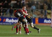 29 November 2013;  CJ Stander, Munster spills the ball in the tackle. Celtic League 2013/14, Round 9, Newport Gwent Dragons v Munster, Rodney Parade, Newport, Wales. Picture credit: Steve Pope / SPORTSFILE