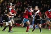 29 November 2013; Damien Varley, Munster bursts through the Newport Gwent Dragons defence. Celtic League 2013/14, Round 9, Newport Gwent Dragons v Munster, Rodney Parade, Newport, Wales. Picture credit: Steve Pope / SPORTSFILE
