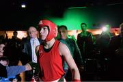 29 November 2013; Ireland's Katie Taylor, Bray Boxing Club, right,makes her way to the ring prior to her fight with Caroline Verveyre, Canada. Road to Rio with Katie Taylor and Bray Boxing Club, Mansion House, Dublin. Photo by Sportsfile