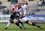 30 November 2013; John Afoa, Ulster, is tackled by Gonzalo Garcia, Zebre. Celtic League, Round 9, Zebre v Ulster, Stadio XXV Aprile, Parma, Italy. Picture credit: Roberto Bregani / SPORTSFILE
