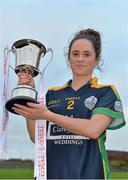 30 November 2013; Claregalway captain Fabienne Cooney with the cup after the game. TESCO HomeGrown All-Ireland Intermediate Club Final, Claregalway, Galway v Thomas Davis, Dublin, St. Lomans GAA Club, Mullingar, Co. Westmeath. Picture credit: Brendan Moran / SPORTSFILE