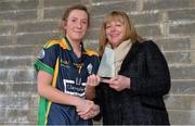 30 November 2013; Claregalway's Megan Glynn is presented with the Player of the Match by Maire Hickey, Vice President, Ladies Gaelic Football Association. TESCO HomeGrown All-Ireland Intermediate Club Final, Claregalway, Galway v Thomas Davis, Dublin, St. Lomans GAA Club, Mullingar, Co. Westmeath. Picture credit: Brendan Moran / SPORTSFILE