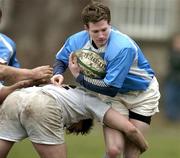 19 February 2005; Killian O'Boyle, Garryowen, is tackled by John Quigley, Dublin University. AIB All Ireland League 2004-2005, Division 1, Dublin University v Garryowen, College Park, Trinity College, Dublin. Picture credit; Brendan Moran / SPORTSFILE