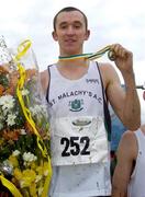 19 February 2005; Gary Murray, St. Malachy's A.C., with his gold medal after winning the Senior Mens event. AAI National Inter Club Cross Country Championships, Santry, Dublin. Picture credit; Brian Lawless / SPORTSFILE
