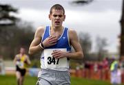 19 February 2005; Danny Darcy, St. L. O'Toole A.C., crosses the finish line to win the Junior Mens event. AAI National Inter Club Cross Country Championships, Santry, Dublin. Picture credit; Brian Lawless / SPORTSFILE