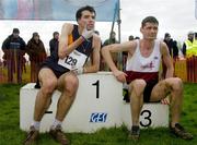 19 February 2005; Second place Mark Kenneally, Clonliffe Harriers A.C., and third place Paul McNamara, Athenry, watch on as gold medallist Gary Murray, out of picture, St. Malachy's A.C., is interviewed by journalists. Senior Mens event. AAI National Inter Club Cross Country Championships, Santry, Dublin. Picture credit; Brian Lawless / SPORTSFILE