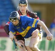20 February 2005; Michael Webster, Tipperary, in action against Stephen Murray, Down. Allianz National Hurling League, Division 1B, Tipperary v Down, Semple Stadium, Co.Tipperary. Picture credit; David Maher / SPORTSFILE